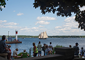 Tourists Viewing Tall Ships on St. Lawrence River